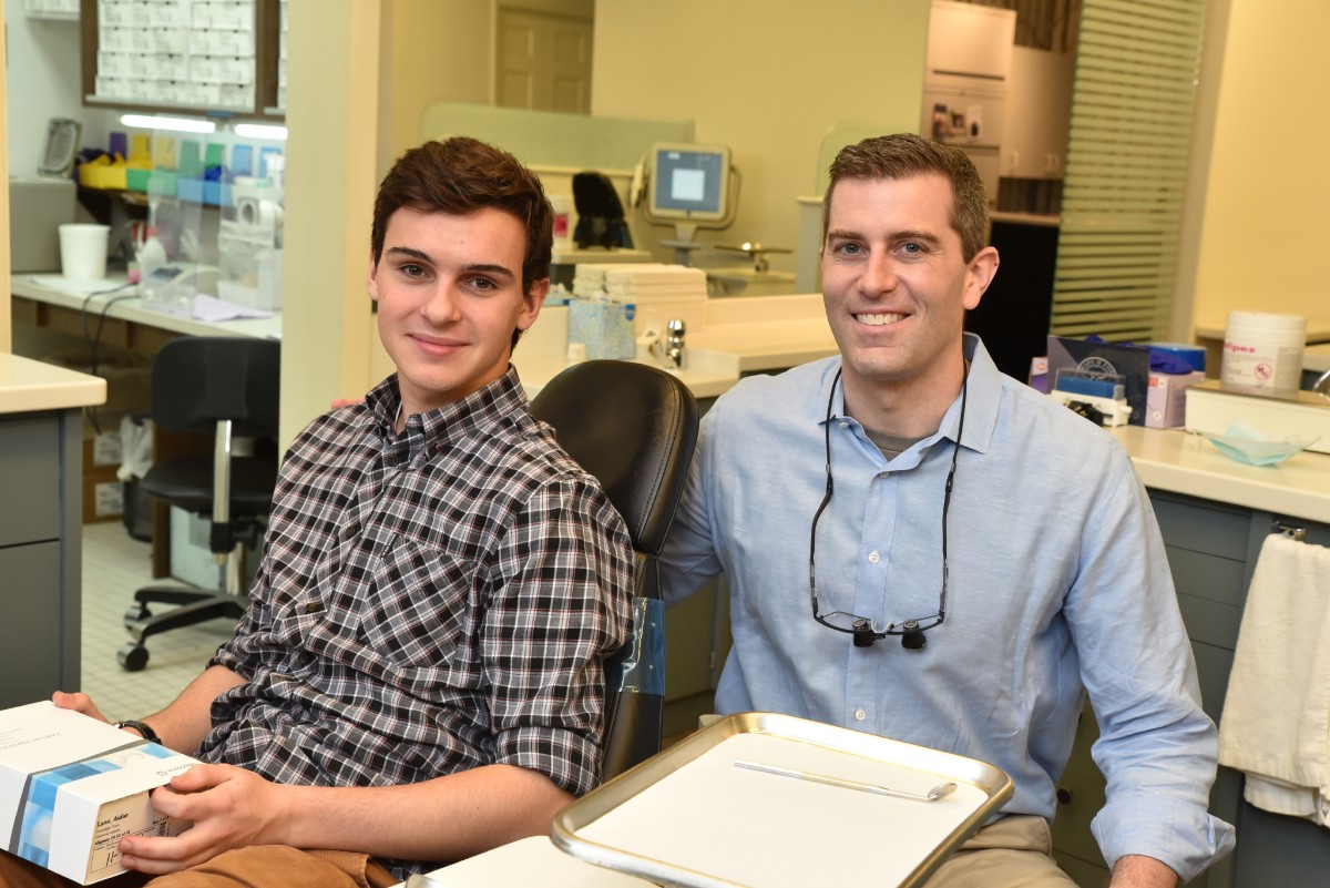 Brady smiling with patient